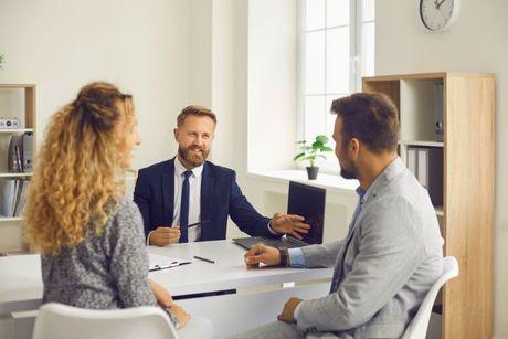 A couple taking a joint mortgage with credit checks.