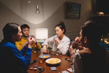 a group of friends gambling on a game