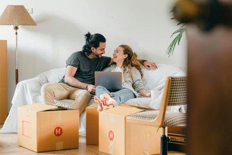 A couple looking at each other discussing about how to get a mortgage with bad credit but good income.