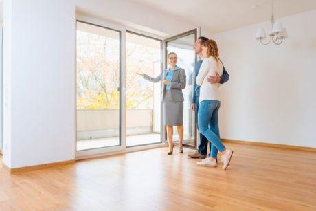 A couple meeting a letting agent after proving their right to rent with a share code.