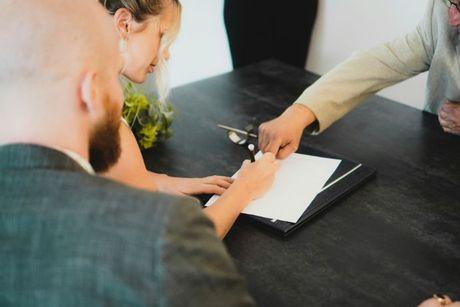 A picture of a woman and her partner applying for a personal loan.