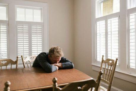 A picture of a man feeling stressed and sad after filing for bankruptcy in the UK.