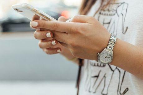 Girl checking her own credit report and score on an iPhone.