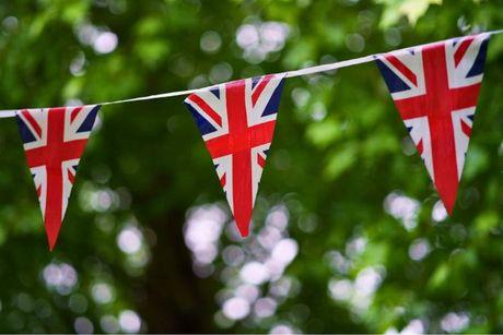 An image of UK flags on voting day in the UK.